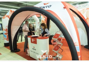 Advertising stand with branding: tent and advertising VENTO counter.