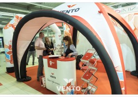 Advertising stand with branding: tent and advertising VENTO counter.